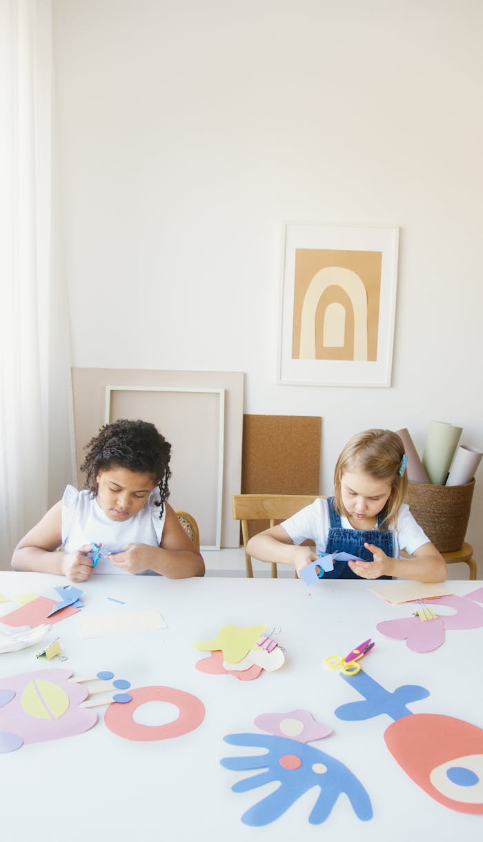 Two Kids Doing Some Artworks